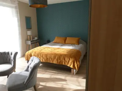 Un ou plusieurs lits dans un hébergement de l'établissement Le Clos de l'Abré