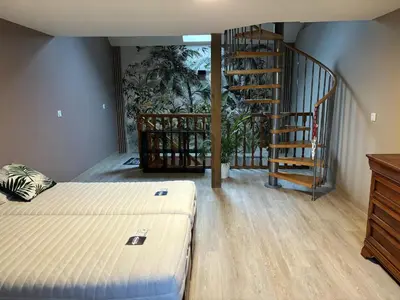 Un ou plusieurs lits dans un hébergement de l'établissement Maison charmante près de Sains avec spa et jardin clos