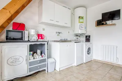 Cuisine ou kitchenette dans l'établissement Gite Barbey