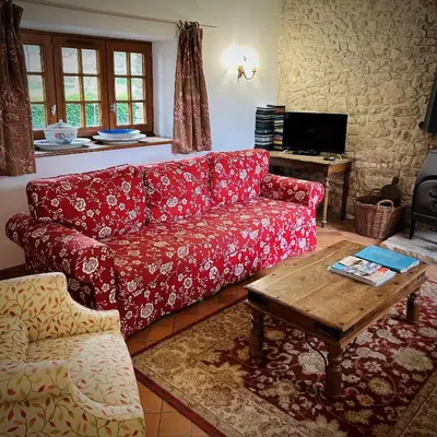Coin salon dans l'établissement CHATEAU DE MONFREVILLE