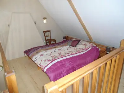 Un ou plusieurs lits dans un hébergement de l'établissement LA VUULE MAISON