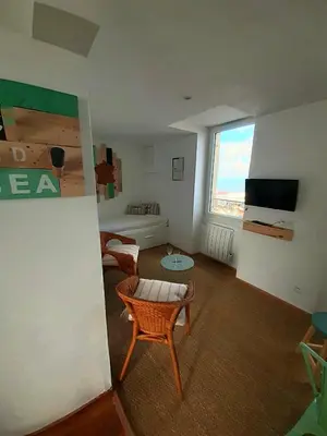 Télévision ou salle de divertissement dans l'établissement LUC and SEA