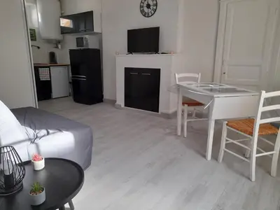 Cuisine ou kitchenette dans l'établissement Promo Studio Wi-Fi à Courseulles-sur-Mer au 1er étage