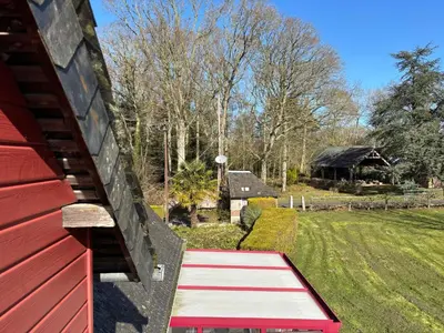 Jardin de l'établissement Maison de campagne lumineuse spacieuse dans impasse au calme a proximité d'un chateau deux vérandas grand jardin cabane pour vélos, pres Port en Bessin et Bayeux, proche plages du débarquement