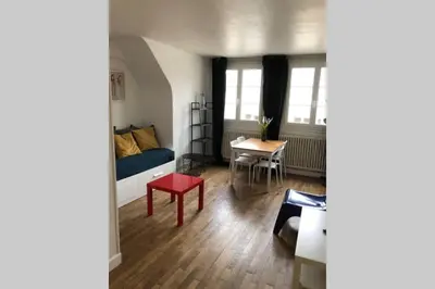Coin salon dans l'établissement Appartement Caen Hyper Centre