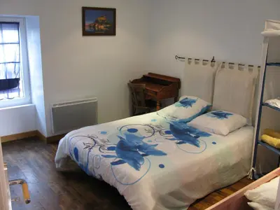 Un ou plusieurs lits dans un hébergement de l'établissement Gîte Aristide Mont Saint Michel