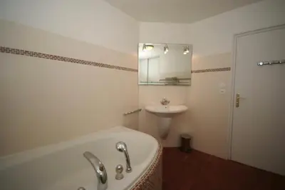 Salle de bains dans l'établissement Le Pressoir