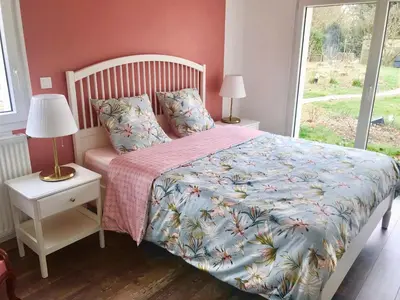 Un ou plusieurs lits dans un hébergement de l'établissement Maison Blanche en Côte de Nacre