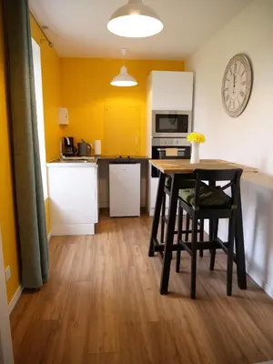 Cuisine ou kitchenette dans l'établissement Les Gîtes du Couesnon