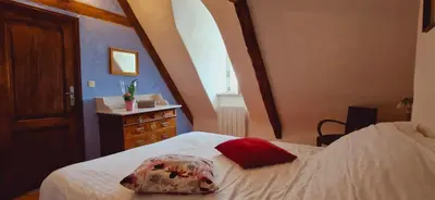 Un ou plusieurs lits dans un hébergement de l'établissement Le domaine des Roseraies,