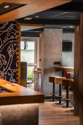 Coin salon dans l'établissement ibis budget Cabourg Dives sur Mer