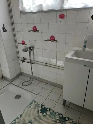 Salle de bains dans l'établissement Les sables d'or