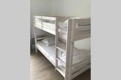 Un ou plusieurs lits dans un hébergement de l'établissement Côté Mer - Maison (3P) au calme proche de la mer
