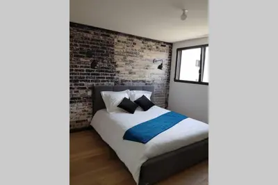 Un ou plusieurs lits dans un hébergement de l'établissement La Villa Thelma 5 étoiles, piscine, sauna et jacuzzi