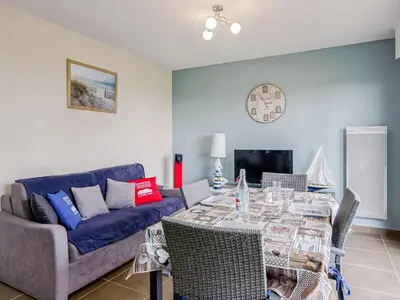 Télévision ou salle de divertissement dans l'établissement Apartment Les Hauts de Port Mer by Interhome
