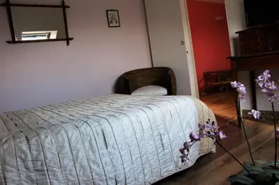 Un ou plusieurs lits dans un hébergement de l'établissement B&B La Gautraie