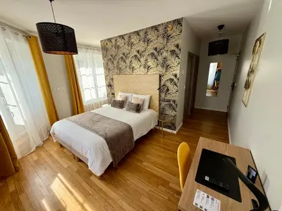 Un ou plusieurs lits dans un hébergement de l'établissement OXXOTEL & Spa
