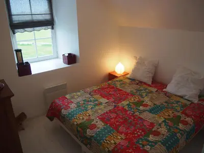 Un ou plusieurs lits dans un hébergement de l'établissement Maison Tombelaine