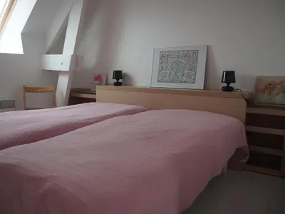 Un ou plusieurs lits dans un hébergement de l'établissement Maison Leonard
