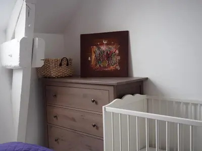 Un ou plusieurs lits dans un hébergement de l'établissement Maison Leonard