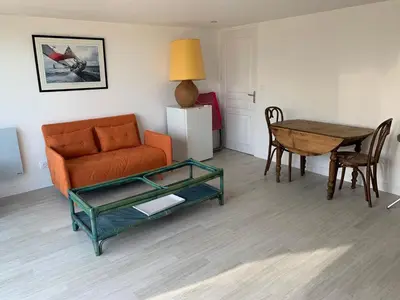 Coin salon dans l'établissement suite junior OMAHA BEACH