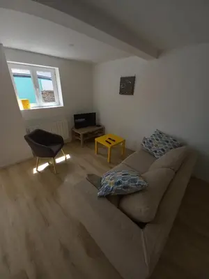 Coin salon dans l'établissement petite maison proche centre ville