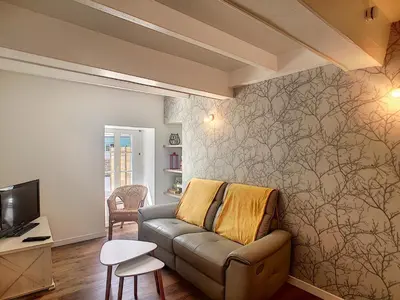 Coin salon dans l'établissement petite maison proche centre ville