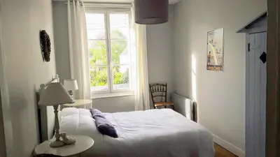 Un ou plusieurs lits dans un hébergement de l'établissement Le Cottage de la Plage - 2ch, 2 SDB - Terrasse - Déco de charme - 500m plage