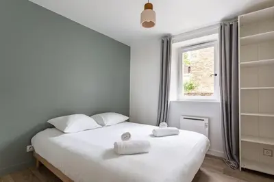 Un ou plusieurs lits dans un hébergement de l'établissement La Brise- Joli T2 rénové - Vue Mer - 1 chambre