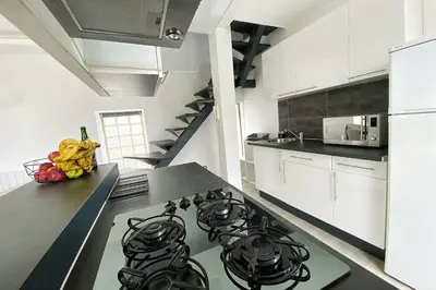 Cuisine ou kitchenette dans l'établissement Le cottage GAMA Suisse Normande