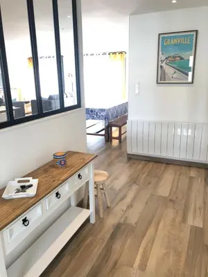 Coin salon dans l'établissement Maison proximité Golf et plage de Bréville sur Mer