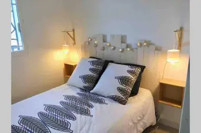 Un ou plusieurs lits dans un hébergement de l'établissement Cabourg-la mer à perte de vue