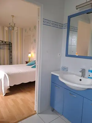 Un ou plusieurs lits dans un hébergement de l'établissement Chambres d'hôtes La Rive - Le Mont Saint Michel