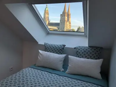 Un ou plusieurs lits dans un hébergement de l'établissement Nouveau ! Appartement loft hyper centre Bayeux