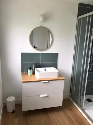 Salle de bains dans l'établissement Gîte Le Coq Au Vert en Suisse Normande