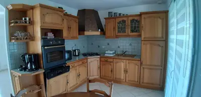 Cuisine ou kitchenette dans l'établissement Gîte 