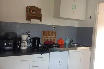 Cuisine ou kitchenette dans l'établissement Votre appartement à 200m de la plage