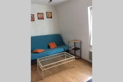 Coin salon dans l'établissement Votre appartement à 200m de la plage