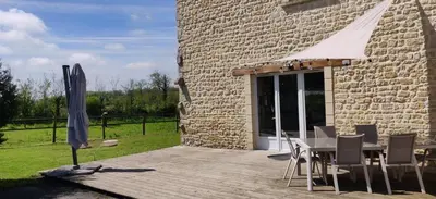 Terrasse ou espace extérieur de l'établissement Maison en pleine nature proche plage Omaha Beach!