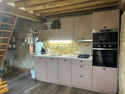 Cuisine ou kitchenette dans l'établissement Gîte La Boulangerie de La Trigalle avec SPA privé