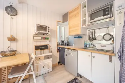 Cuisine ou kitchenette dans l'établissement Le ptit passage