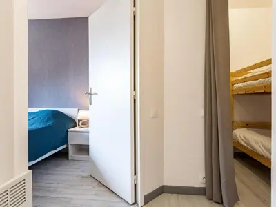 Un ou plusieurs lits dans un hébergement de l'établissement Apartment Galion 1 et 2 by Interhome