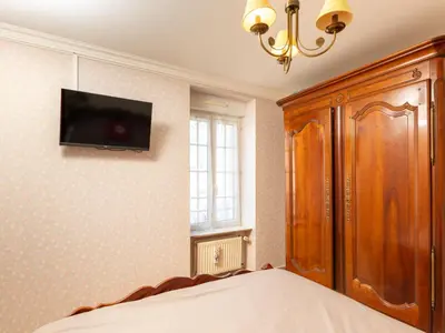 Télévision ou salle de divertissement dans l'établissement Holiday Home La Grève by Interhome