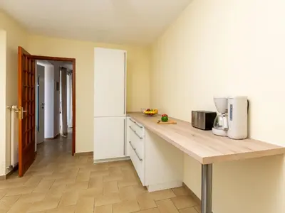 Cuisine ou kitchenette dans l'établissement Holiday Home La Grève by Interhome