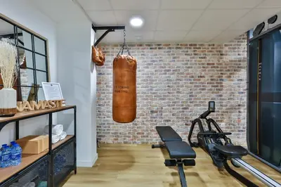 Salle ou équipements de sports de l'établissement Hôtel & Spa FACE À LA MER
