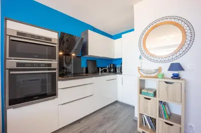 Cuisine ou kitchenette dans l'établissement Les Vagues