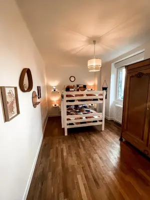Un ou plusieurs lits dans un hébergement de l'établissement LA BUTTE - Maison de vacances Avranches avec vue sur le Mont Saint Michel
