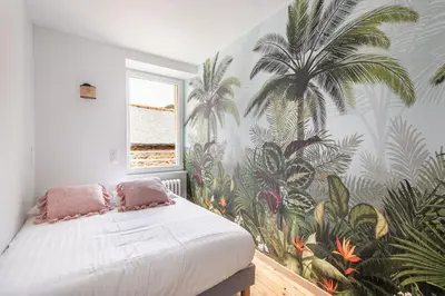 Un ou plusieurs lits dans un hébergement de l'établissement Le Coco de Cancale - Duplex proche mer