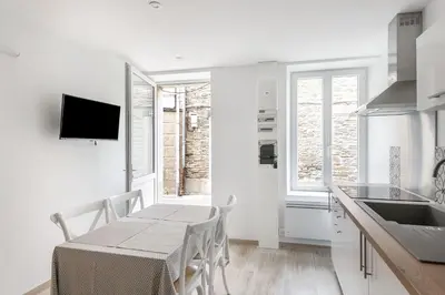 Cuisine ou kitchenette dans l'établissement Le Coco de Cancale - Duplex proche mer