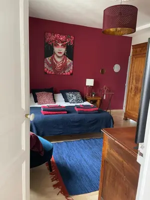 Un ou plusieurs lits dans un hébergement de l'établissement Villa des Roses